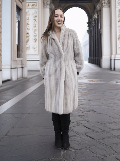 Front view of Sapphire Grey Mink Fur Coat S Petit Excellent, styled with black boots for a chic winter outerwear look.