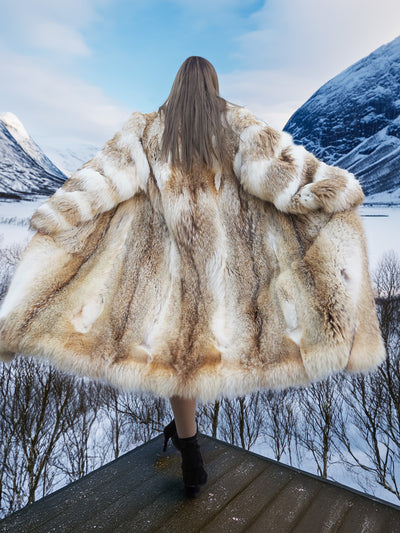 Back view of coyote fur coat with white fox trim