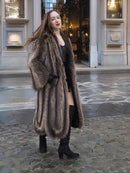Canadian Raccoon Fur Coat with silver tips in size M, featuring a scalloped hem design, styled with black boots for elegant winter fashion.
