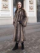 Side view of Canadian Raccoon Fur Coat in silver tips, showcasing scalloped hem and natural fur elegance for winter wear.