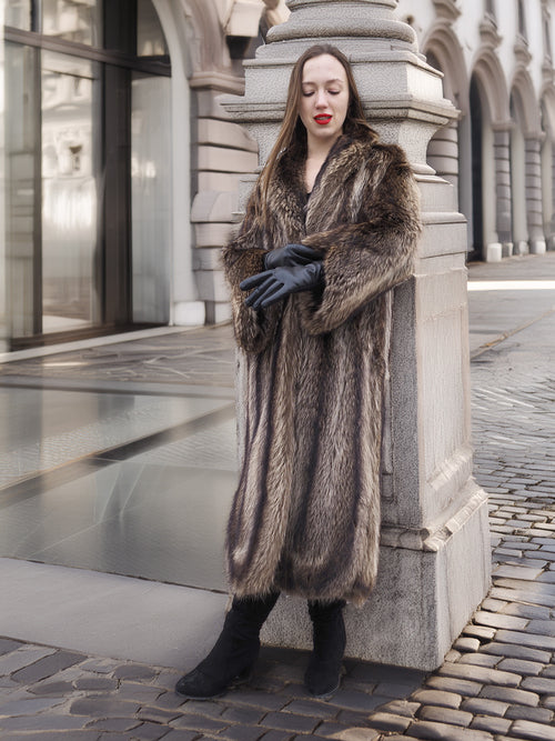 Elegant Canadian Raccoon Fur Coat in silver tips worn with black gloves and boots, perfect for luxury winter outerwear styling.