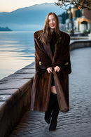 Rich brown mink coat with belted waist and textured fur panels, front view