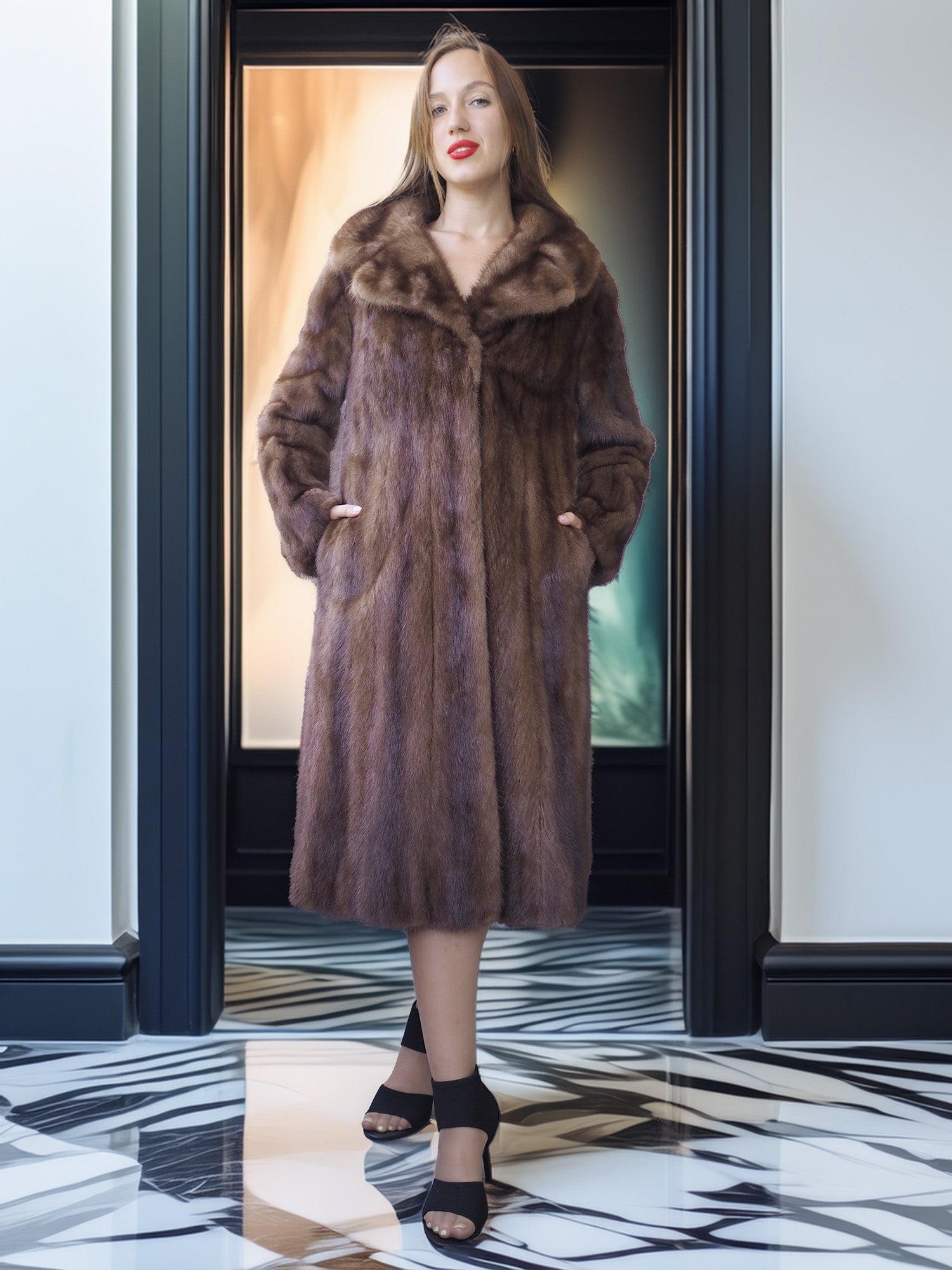 Woman wearing a fur coat standing in a doorway with a patterned floor.
