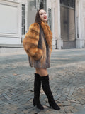 Luxury fur coat featuring American Gray Fox with red fox trim. A sophisticated and warm outerwear piece for stylish winter outfits.