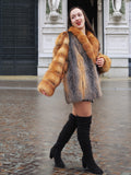 Beautifully crafted gray fox fur coat with red fox accents. A luxurious and warm outerwear piece for winter elegance.