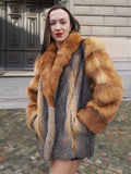 Chic American Gray Fox fur coat with striking red fox details. A timeless and stylish winter coat made in Canada for ultimate luxury.