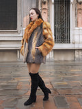 Chic and sophisticated gray fox fur coat with red fox details. A timeless and stylish winter coat for fashion-forward individuals.