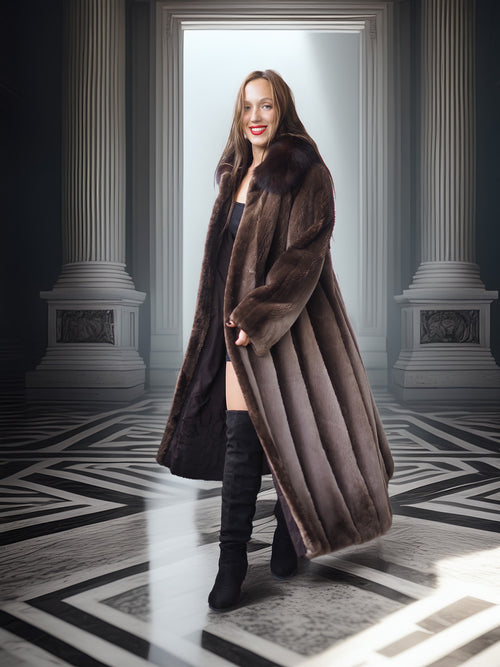 Woman wearing a long brown fur coat in an elegant interior setting