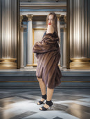 Woman wearing a fur coat in an elegant interior setting