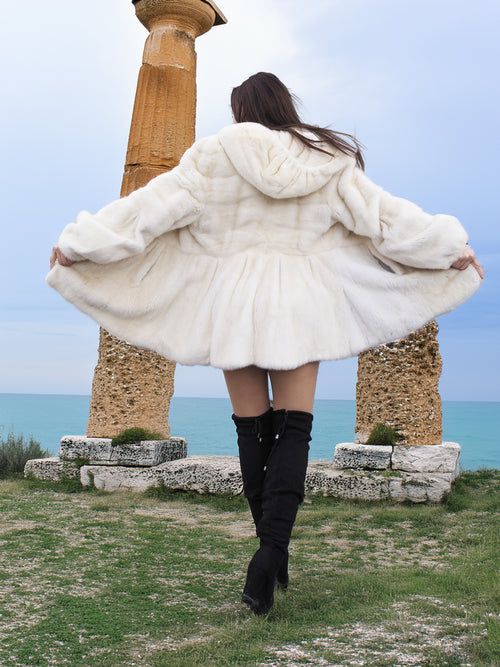 Beige Pearl Mink Fur Coat with hood, offering chic warmth and elegance. Features a luxurious mink texture, hook-eye closure, and satin lining.
