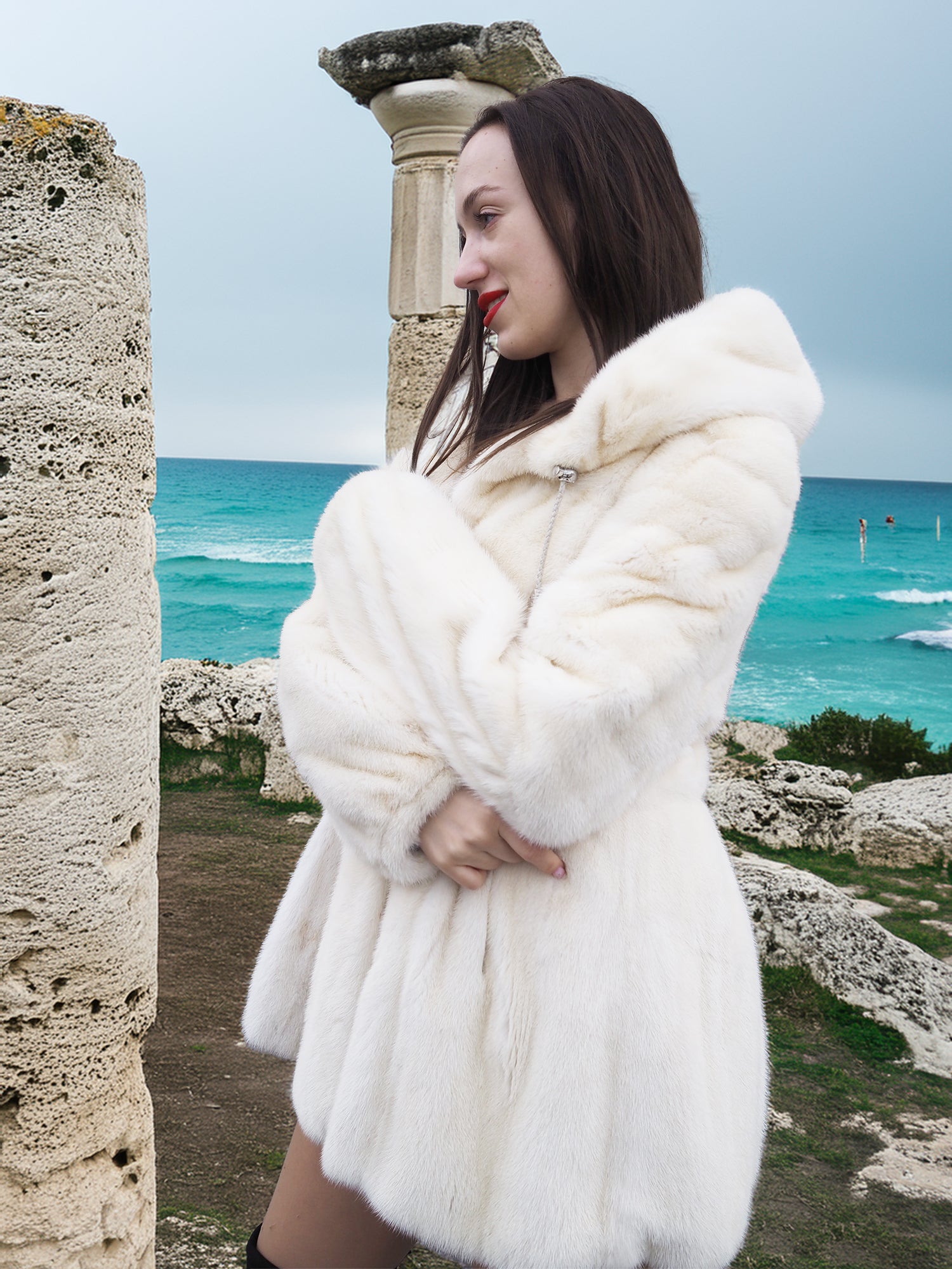 Beige Pearl Mink Fur Coat with hood, offering chic warmth and elegance. Features hook-eye closure, plush mink texture, and satin lining for luxury.