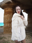Beige Pearl Mink Fur Coat with hood, offering chic warmth and elegance. Features hook-eye closure, satin lining, and pockets for a luxurious feel.
