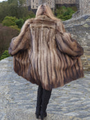 Back view of Fisher Sable Fur Coat with arms spread