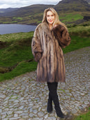 Chic Fisher Sable Fur Coat in lush green setting