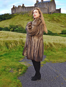Fisher Sable Fur Coat in grassy landscape