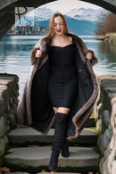 Men’s raccoon fur coat, double-breasted, open front over dark outfit, dark gray-brown
