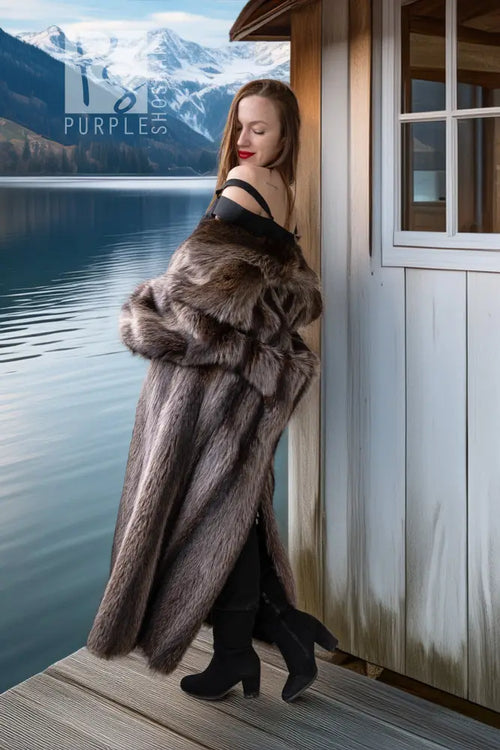 Raccoon fur double-breasted coat with notched lapels and silver button closure