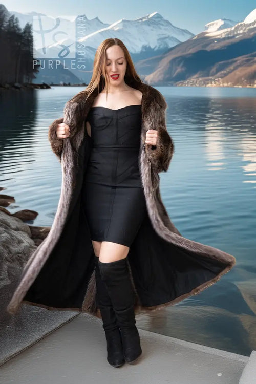 Long raccoon fur double-breasted coat, open front, notched lapels, silver buttons