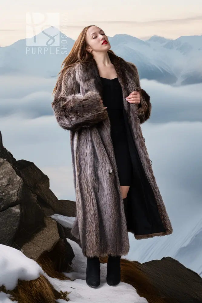 Long raccoon fur double-breasted coat with side fur cuffs and silver button closure