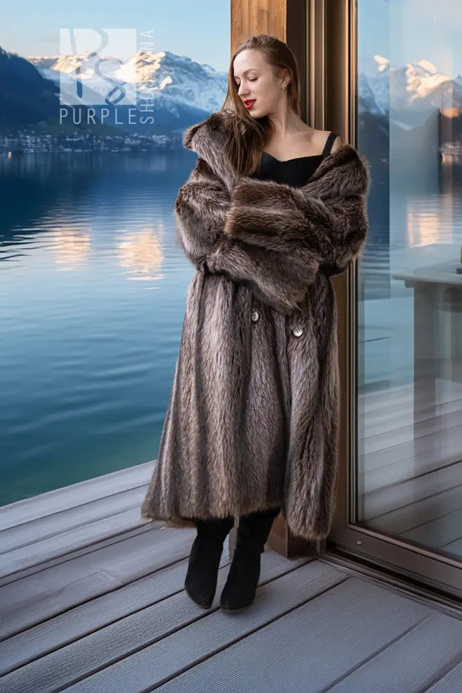 Raccoon fur double-breasted coat with notched lapels, silver buttons, long straight cut