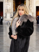 Black mink coat with light fur collar detail, front close-up styling