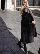 Black mink coat with light fur collar, front view with open neckline