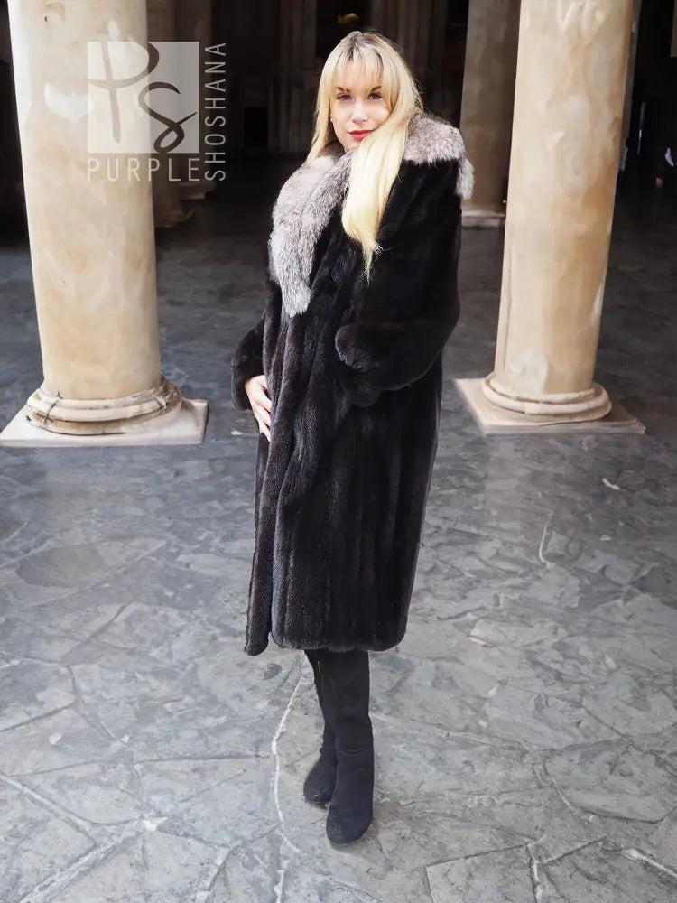 Black mink coat with fox fur cape collar, below-knee length and side button front