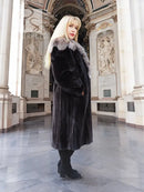 Black mink coat with fox fur cape collar, long length and structured shoulders
