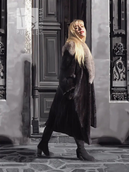Black mink coat with light fur collar and long silhouette, three-quarter view