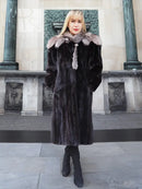 Black mink coat with light gray fox-fur cape collar, long sleeves and knee-length hem