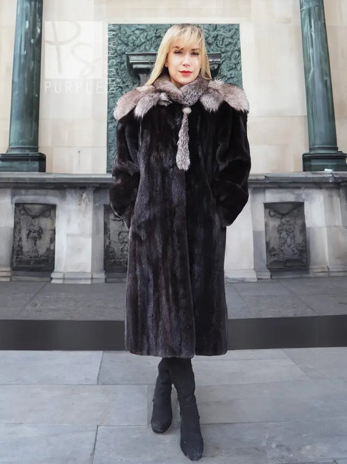 Black mink coat with light gray fox-fur cape collar, long sleeves and knee-length hem