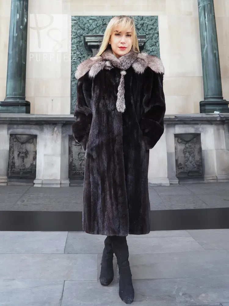 Black mink coat with light gray fox-fur cape collar, long sleeves and knee-length hem
