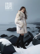 Light cream fox-fur jacket with voluminous sleeves and stand collar, open front.