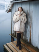 Light cream fox-fur jacket with plush texture, full-length coverage and open front.