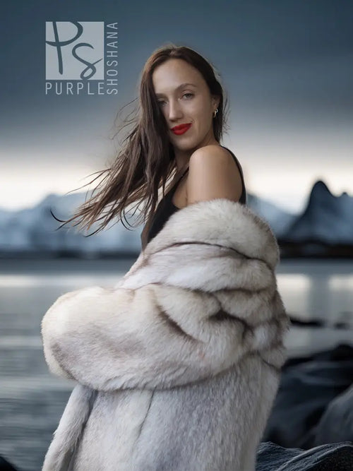 Light cream fox-fur shawl-style jacket with draped shoulders and open front.