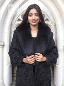Black fur-trim coat with shawl collar, textured pattern, front close-up