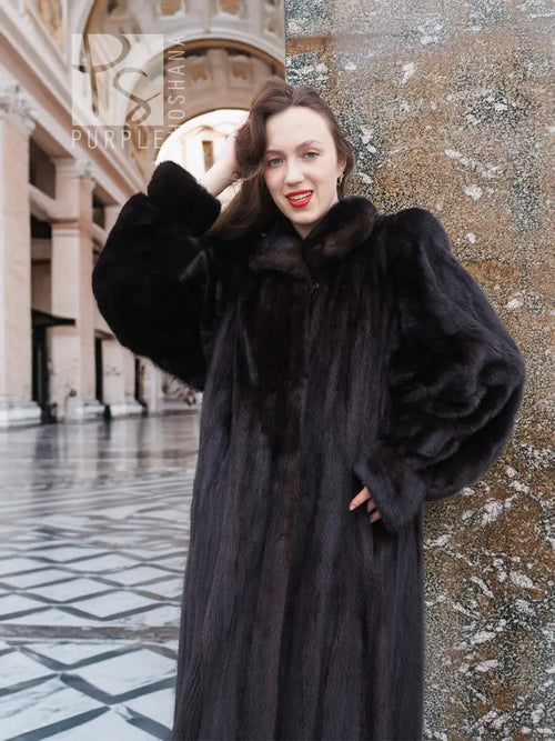Black mink fur coat with stand collar and long sleeves, full-length silhouette