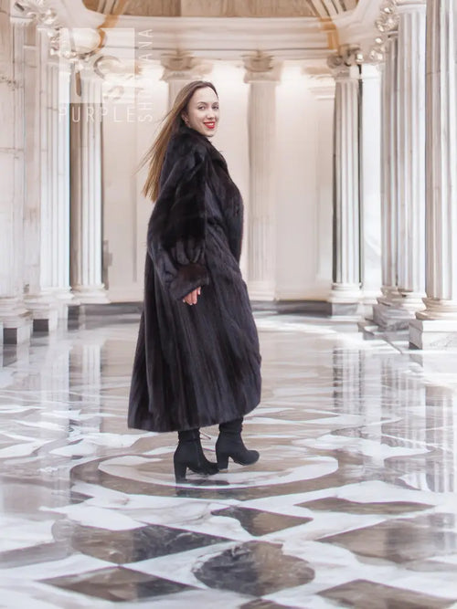 Full-length mink fur coat, dark black, three-quarter view, long A-line silhouette