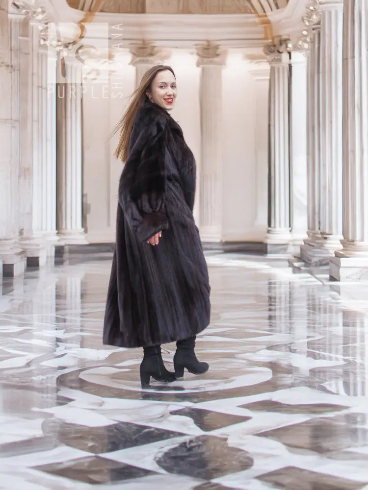 Full-length mink fur coat, dark black, three-quarter view, long A-line silhouette