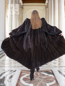 Black mink fur coat back view, full-length with draped shoulders and wide sleeves