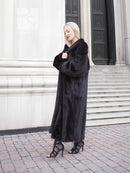 Dark mink fur coat with stand collar look and long, buttonless front