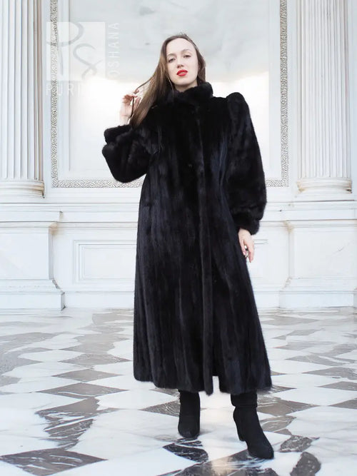 Black mink fur coat, long full-length design with high collar and voluminous sleeves