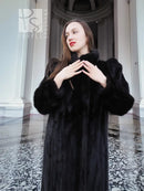 Black mink fur coat with voluminous sleeves and front button closures