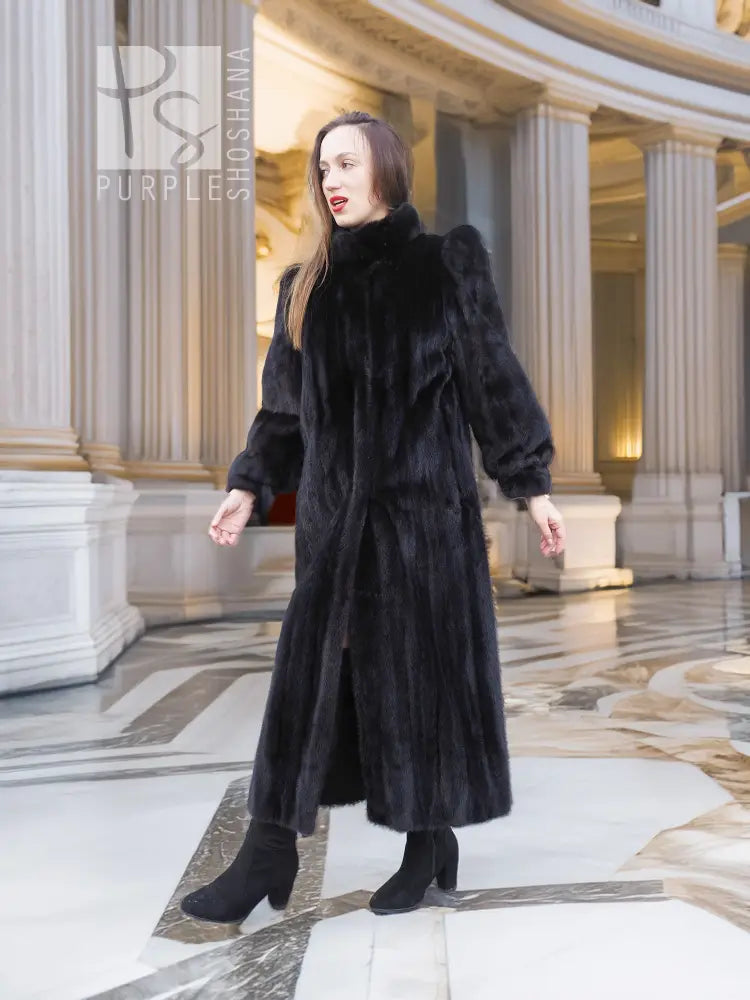 Black mink fur coat, full-length with high collar and long sleeves, front button placket