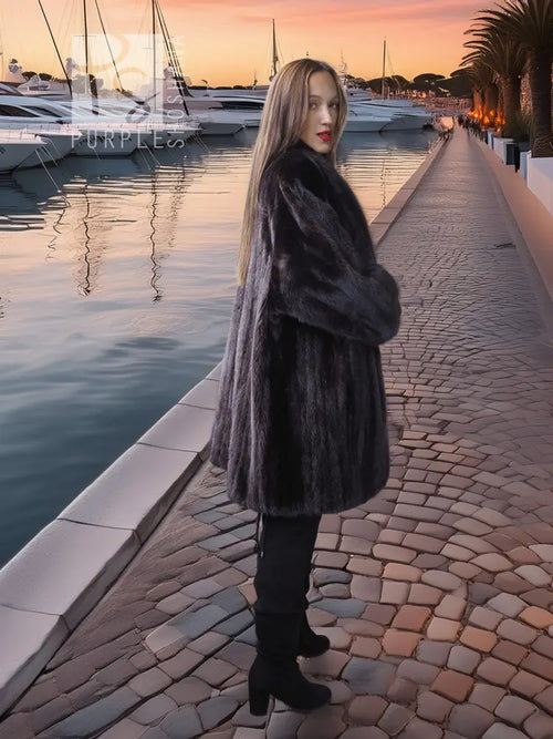 Dark mink fur coat jacket, long length, side view showing plush texture