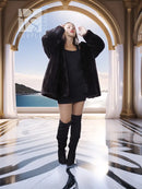 Black mink coat jacket with flared silhouette, open front and full fur sleeves