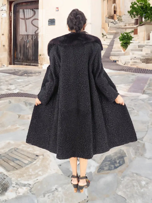 Black curly lamb coat with mink collar, back view flare hem
