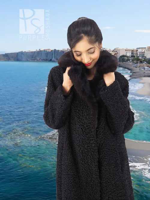 Black curly lamb coat with mink fur collar, front closure detail and long sleeves