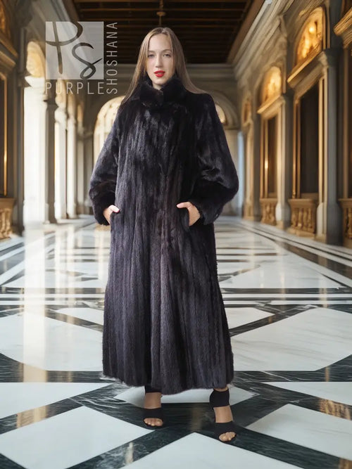 Black mink coat with dramatic sweep, sculpted collar, long hem and wide cuffs