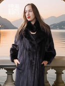 Black mink coat with sculpted collar and wide sleeves, long hem, side view